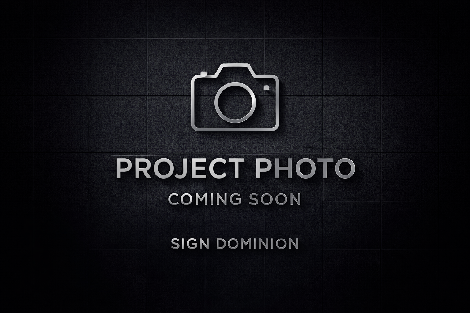 Illuminated storefront channel letters on a building facade